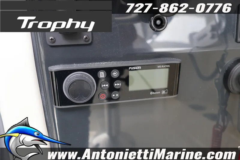 Slide: The Image of 2026 Bayliner Trophy T25 Explorer with Fusion MS-RA70N audio system, Antonietti Marine branding. - 29