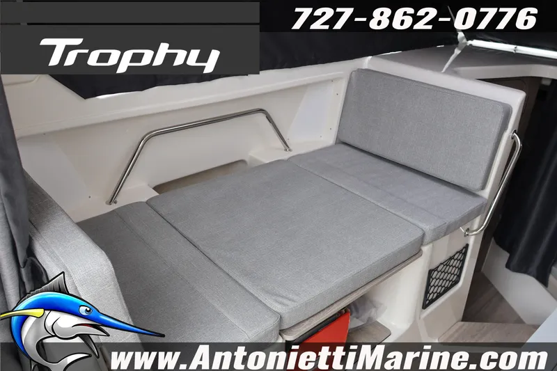 Slide: The Image of 2026 Bayliner Trophy T25 Explorer interior seating with gray cushions, Antonietti Marine branding. - 48