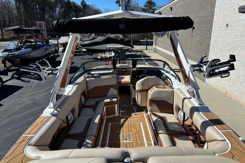 Slide: The Image of 2022 Centurion Ri245 boat interior with luxurious seating and modern design. - 6