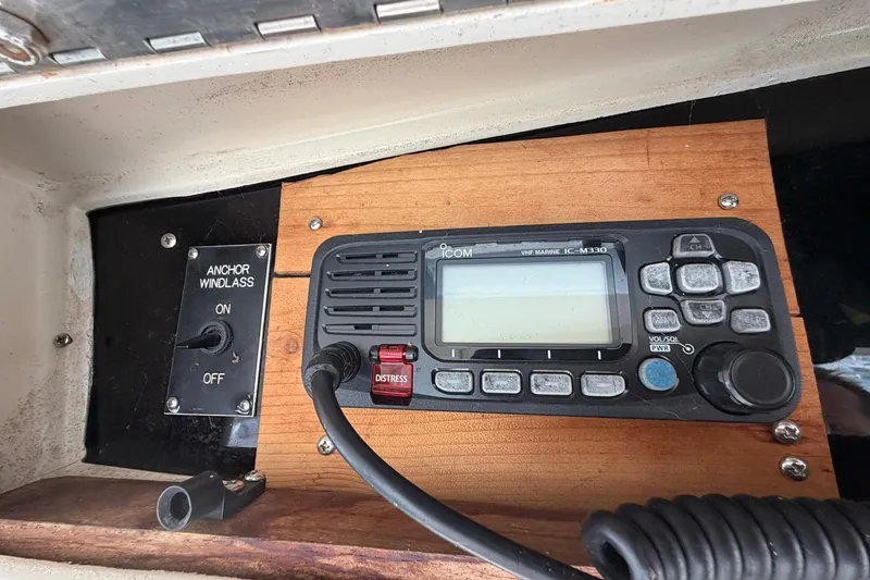 Slide: The Image of VHF marine radio and anchor windlass switch on 1987 Viking 44 Motor Yacht. - 70