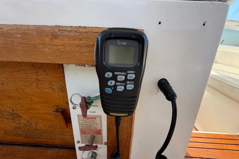 Slide: The Image of ICOM radio on 1987 Viking 44 Motor Yacht, mounted on wooden panel. - 72