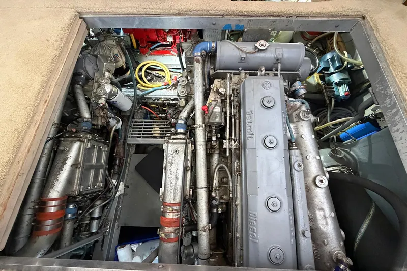 Slide: The Image of Engine room of a 1987 Viking 44 Motor Yacht, featuring Detroit Diesel engines. - 74