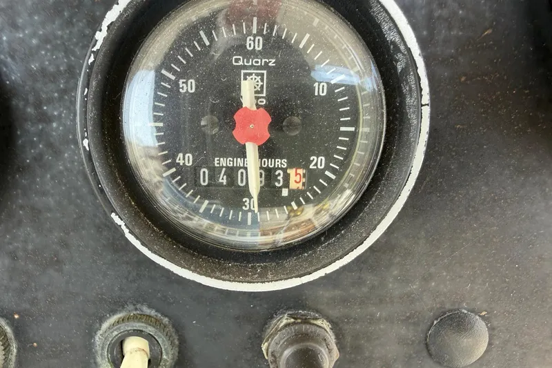 Slide: The Image of Engine hour meter on 1987 Viking 44 Motor Yacht dashboard, showing 4083.5 hours. - 79