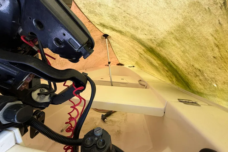 Slide: The Image of Interior view of a 1987 Viking 44 Motor Yacht under a tarp. - 89