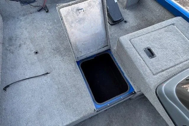 Slide: The Image of Open storage compartment on 2008 Triton TC-17 boat deck. - 13