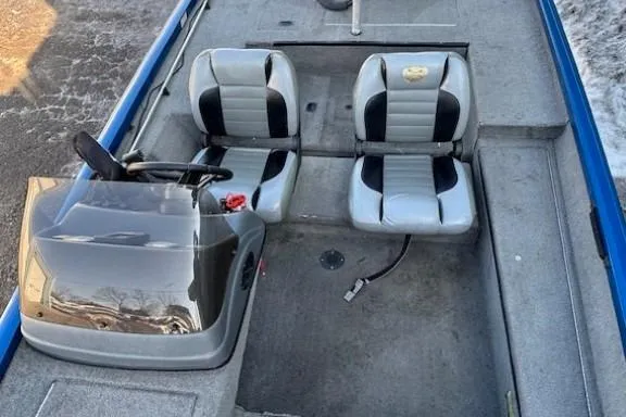 Slide: The Image of 2008 Triton TC-17 boat interior with dual seats and steering console. - 14