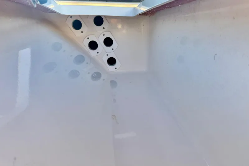 Slide: The Image of Interior view of 2020 Key West 230 Bay Reef boat hull with drainage holes. - 14