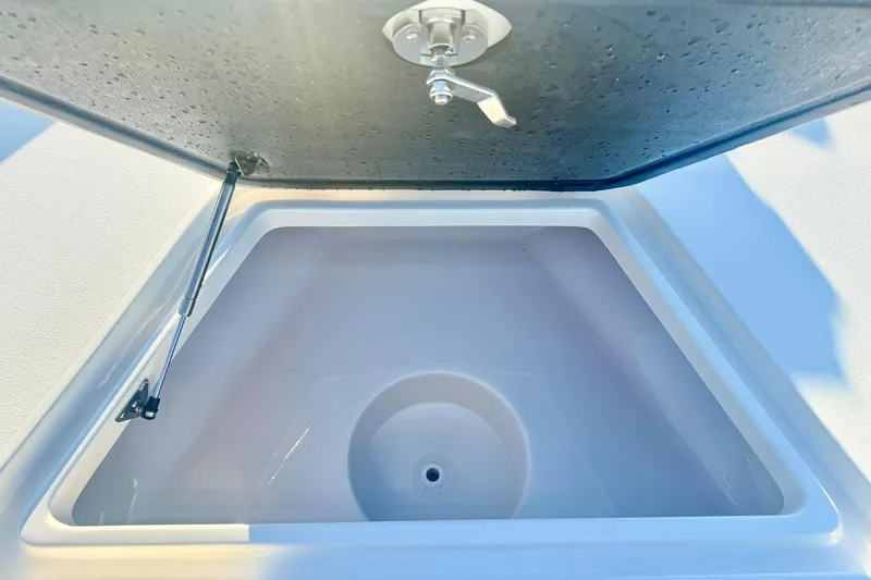 Slide: The Image of Open storage compartment on 2020 Key West 230 Bay Reef boat. - 18