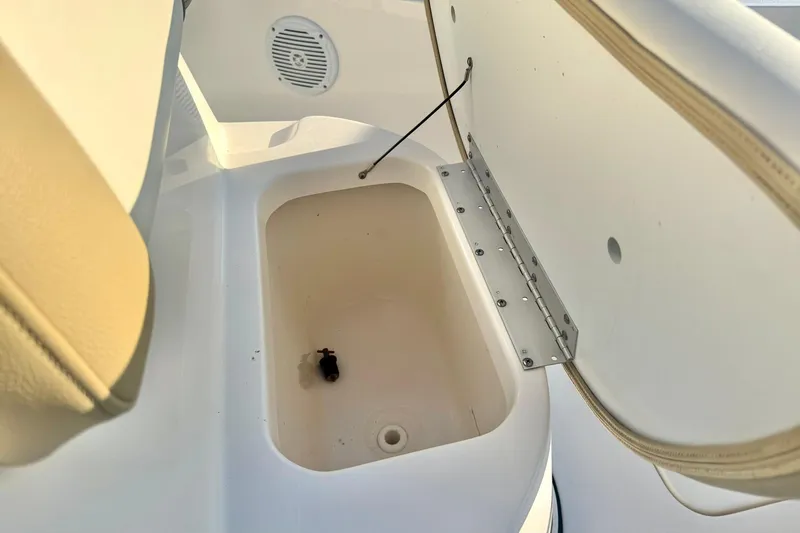 Slide: The Image of Open storage compartment on 2020 Key West 230 Bay Reef boat. - 22
