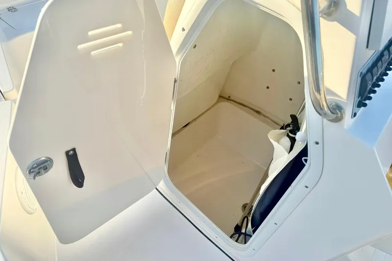 Slide: The Image of Open storage compartment on 2020 Key West 230 Bay Reef boat. - 28