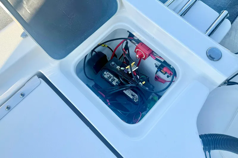 Slide: The Image of Battery compartment of 2020 Key West 230 Bay Reef boat, showing wiring and connections. - 33