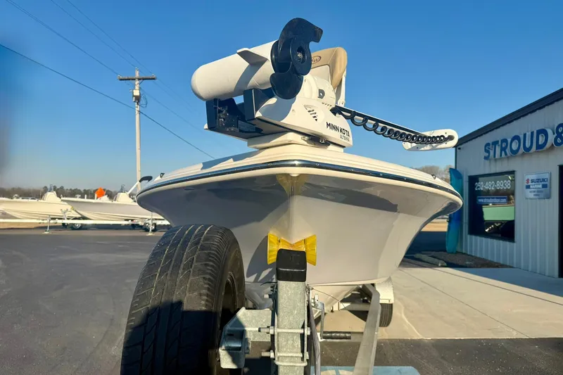 Slide: The Image of 2020 Key West 230 Bay Reef boat on trailer, Minn Kota motor, outdoor dealership. - 8