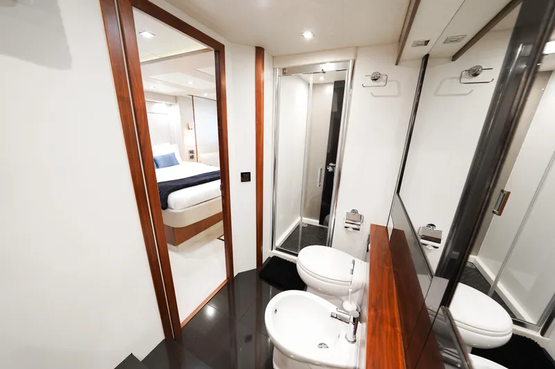 Slide: The Image of Luxurious interior of 2013 Sunseeker Manhattan 73 yacht with elegant wooden vanity. - 23