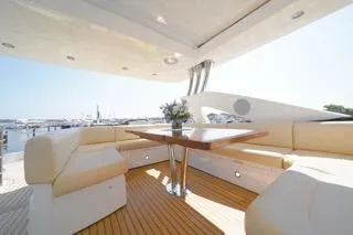 Slide: The Image of Luxurious dining area on 2013 Sunseeker Manhattan 73 yacht, featuring elegant table settings. - 3