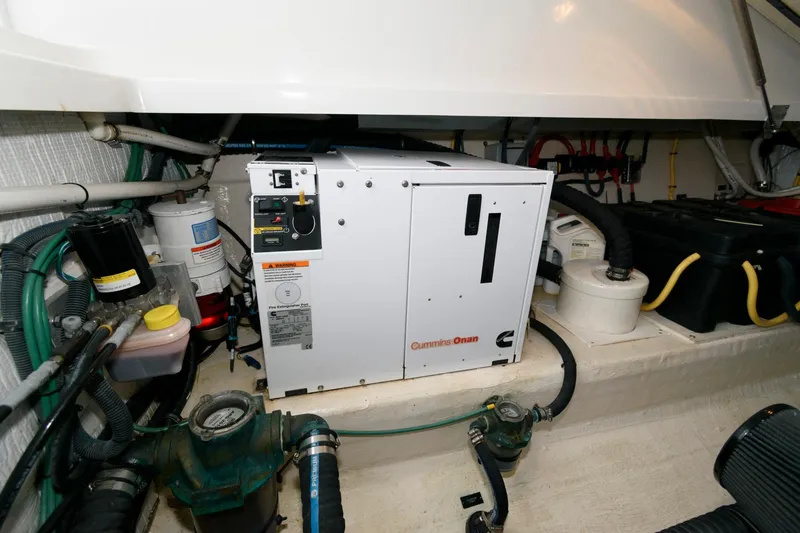 Slide: The Image of Engine room of 2010 Back Cove 33 with Cummins Onan generator. - 28