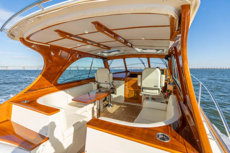Slide: The Image of Luxurious 2010 Hinckley Talaria 44 MKII Express yacht interior with elegant wood finish. - 20