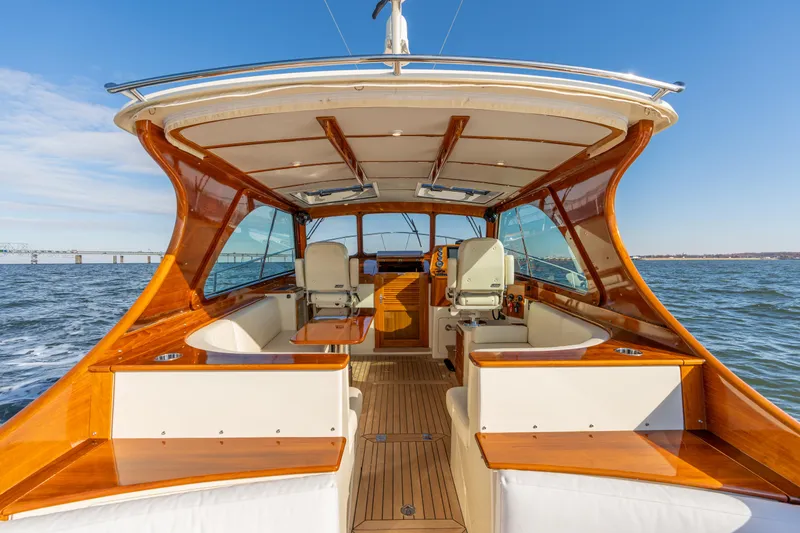 Slide: The Image of 2010 Hinckley Talaria 44 MKII Express yacht interior with elegant wood finish. - 21