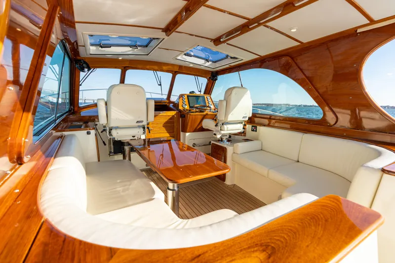 Slide: The Image of Luxurious interior of 2010 Hinckley Talaria 44 MKII Express yacht with elegant wood finish. - 22