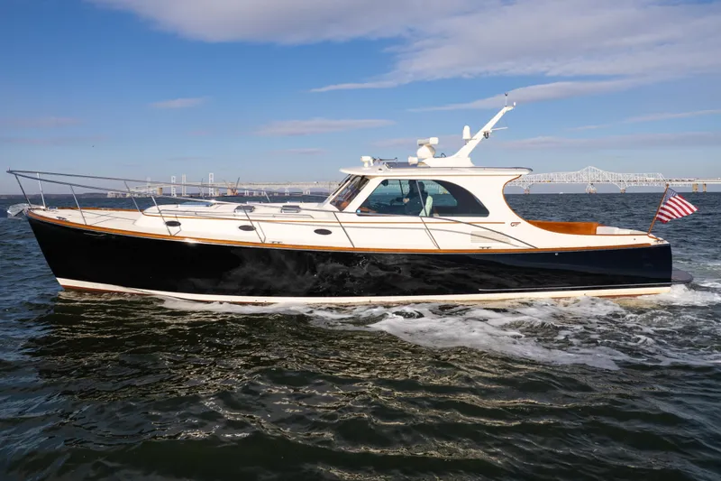 Slide: The Image of 2010 Hinckley Talaria 44 MKII Express cruising on open water. - 3