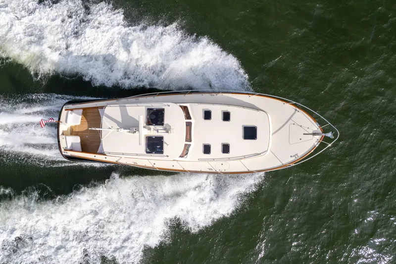 Slide: The Image of Hinckley Talaria 44 MKII Express 2010 cruising on water, aerial view. - 9