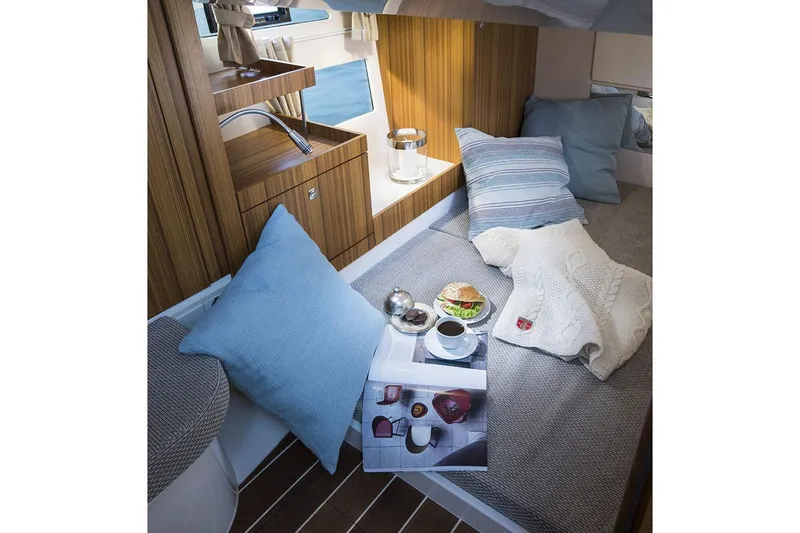 Slide: The Image of Manufacturer Provided Image: Interior of Marex 310 Sun Cruiser 2026 with cozy seating area. - 12