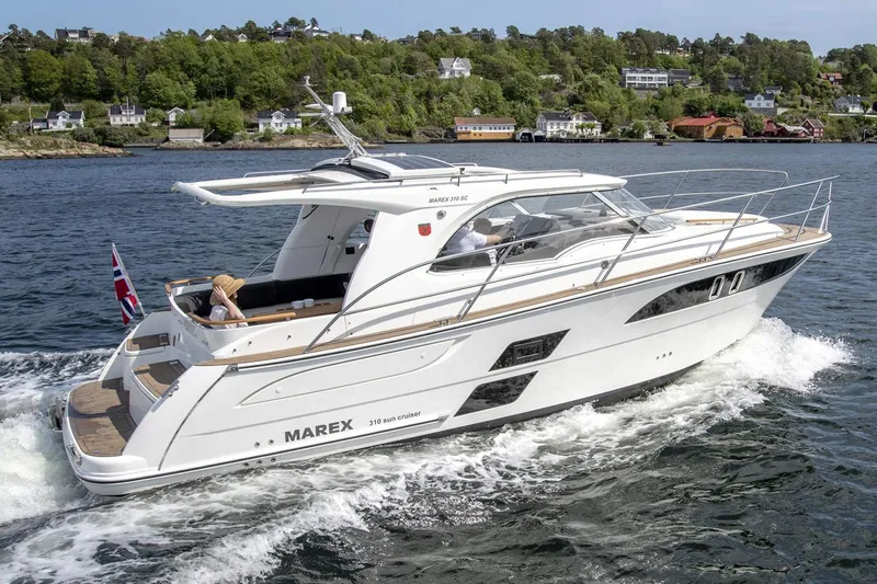 Slide: The Image of Manufacturer Provided Image: Marex 310 Sun Cruiser 2026 on water, side view. - 3