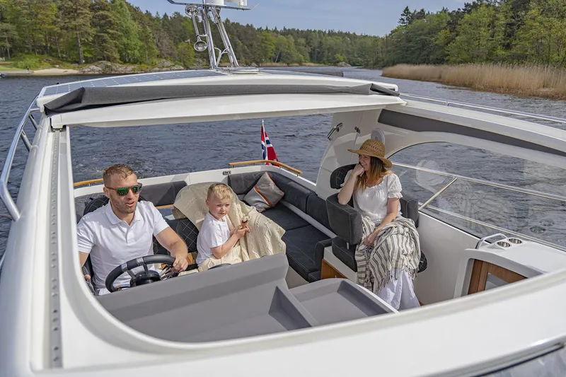 Slide: The Image of Manufacturer Provided Image: Family enjoying a boat ride on Marex 310 Sun Cruiser, 2026 model. - 6