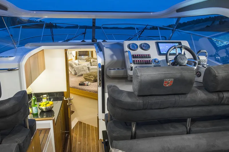 Slide: The Image of Manufacturer Provided Image: Interior of Marex 310 Sun Cruiser 2026 with cockpit and cabin. - 7