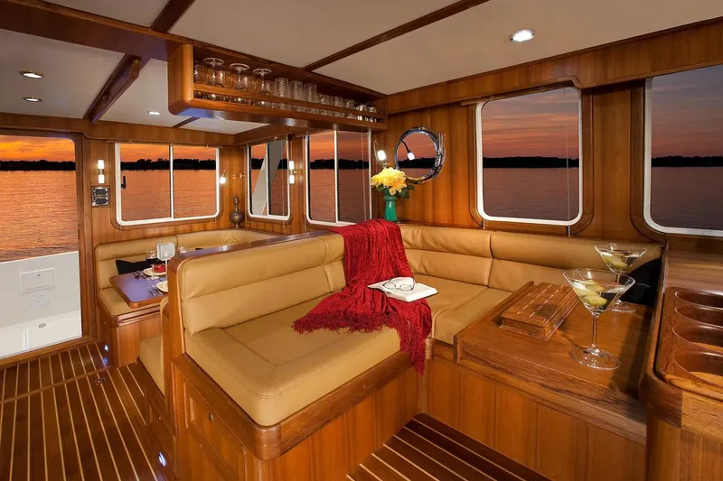 Slide: The Image of Luxurious interior of 2025 Helmsman Trawlers 38 Sedan with sunset view. - 14
