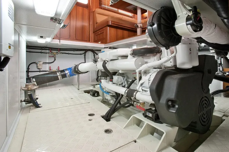 Slide: The Image of Engine room of 2025 Helmsman Trawlers 38 Sedan, showcasing mechanical components. - 25