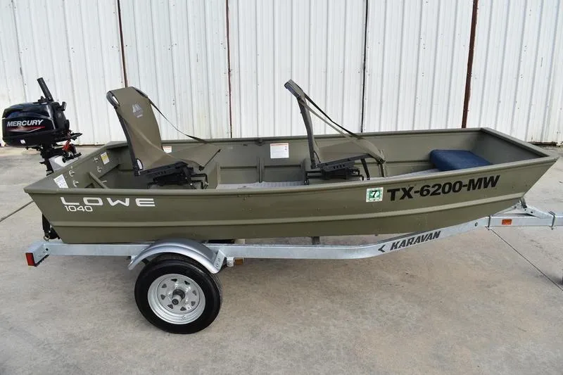 The Image of 2024 Lowe L1040 Jon boat on trailer with Mercury outboard motor. - 0