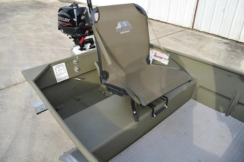 Slide: The Image of 2024 Lowe L1040 Jon boat with Mercury outboard motor and foldable seat. - 2