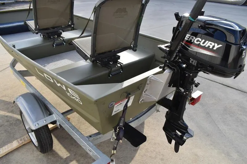 Slide: The Image of 2024 Lowe L1040 Jon boat with Mercury outboard motor on trailer. - 3