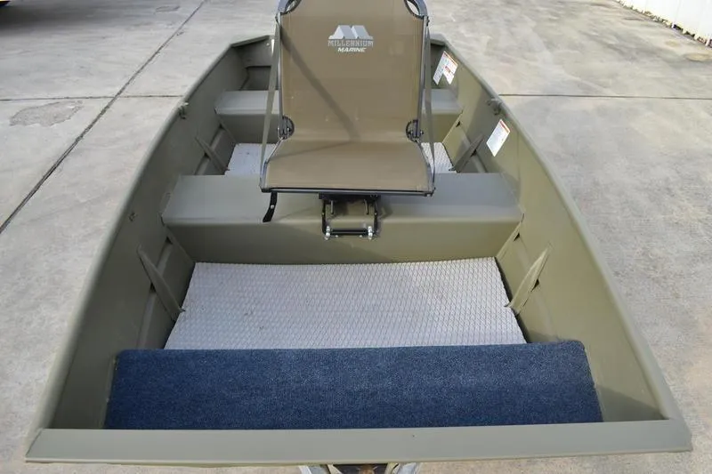 Slide: The Image of 2024 Lowe L1040 Jon boat with seating, shown on concrete surface. - 6