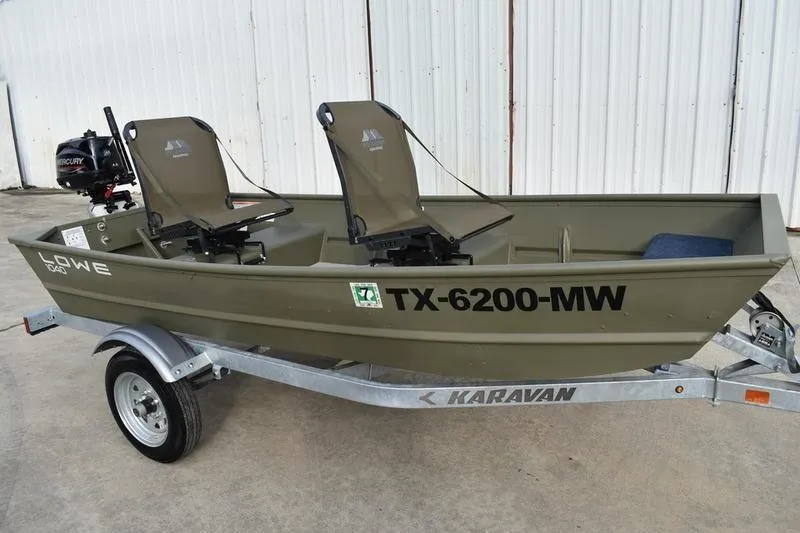 Slide: The Image of 2024 Lowe L1040 Jon boat on Karavan trailer, featuring two seats and Mercury outboard motor. - 7