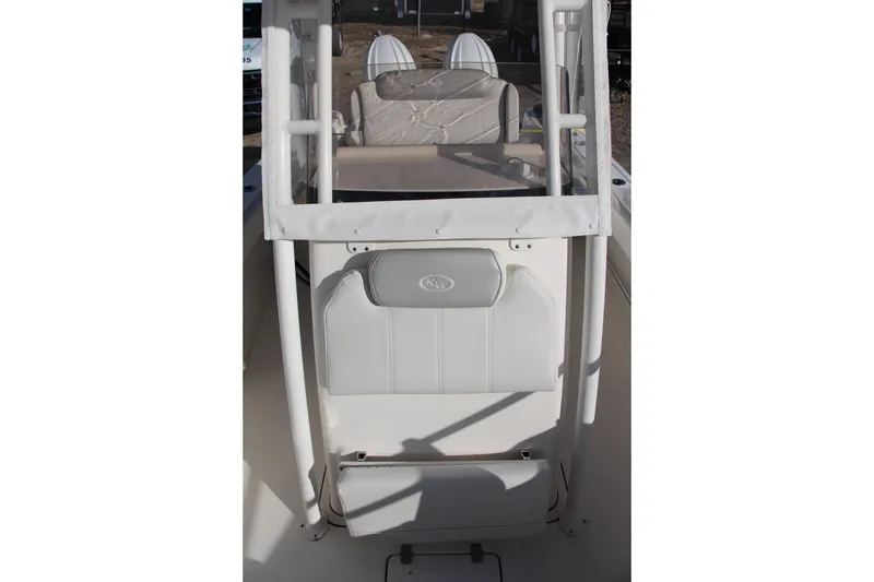 Slide: The Image of 2024 Key West 244 Center Console boat interior with seating and console details. - 15