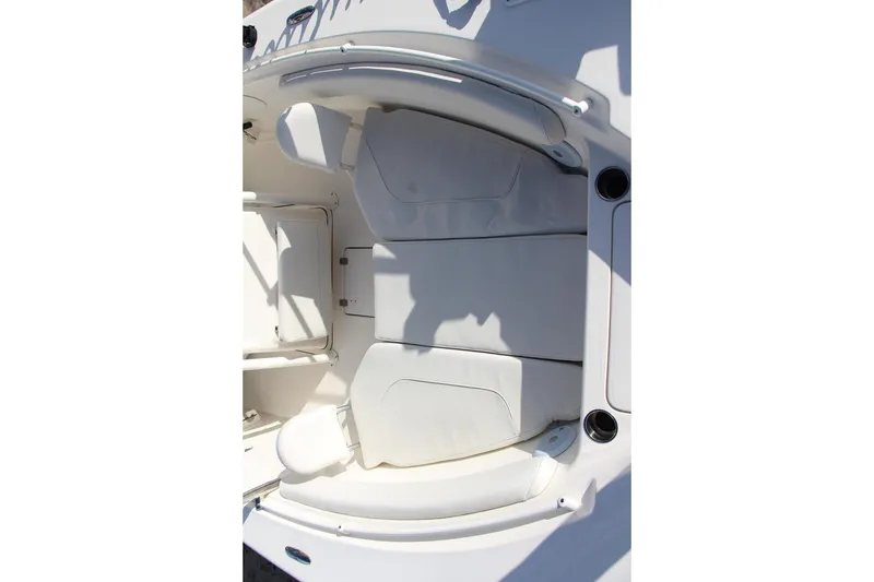 Slide: The Image of 2024 Key West 244 Center Console boat interior with cushioned seating. - 16