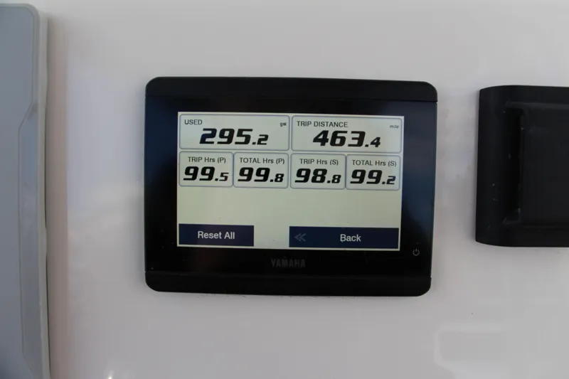 Slide: The Image of Yamaha display on 2024 Key West 244 Center Console showing trip data and fuel usage. - 18