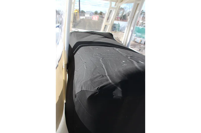 Slide: The Image of 2024 Key West 244 Center Console interior with protective cover. - 19