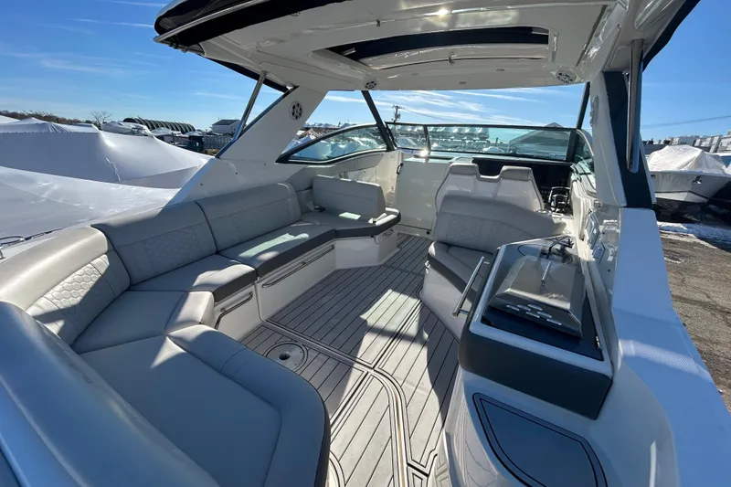 Slide: The Image of 2021 Sea Ray Sundancer 320 interior with sleek seating and modern design. - 3