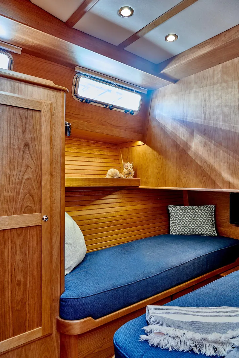 Slide: The Image of Interior of 2027 Sabre 45 Salon Express with wooden finish. - 15