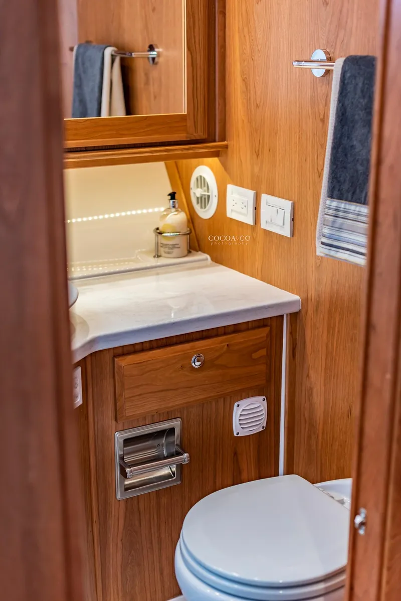 Slide: The Image of Luxurious bathroom in Sabre 45 Salon Express 2027 yacht. - 26