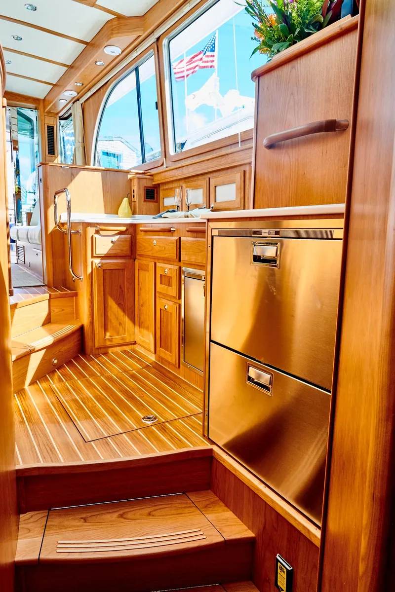 Slide: The Image of Interior of 2027 Sabre 45 Salon Express with wooden finish. - 28