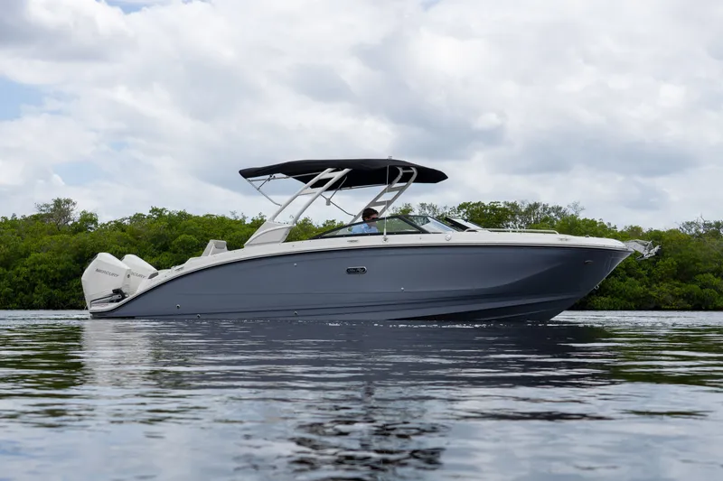 Slide: The Image of 2026 Sea Ray SDX 290 Outboard on calm water. - 0