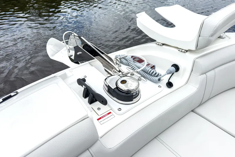 Slide: The Image of Sea Ray SDX 290 Outboard 2026, boat equipment by the water. - 21