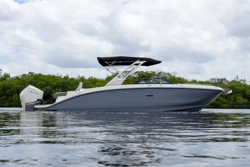 Slide: The Image of 2026 Sea Ray SDX 290 Outboard on calm water. - 27