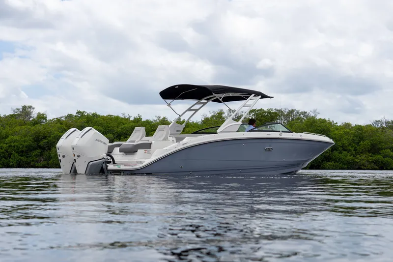 Slide: The Image of 2026 Sea Ray SDX 290 Outboard on calm water. - 3