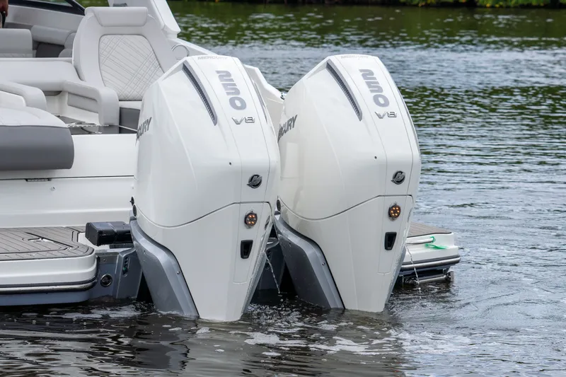 Slide: The Image of 2026 Sea Ray SDX 290 Outboard with twin Mercury engines on water. - 4