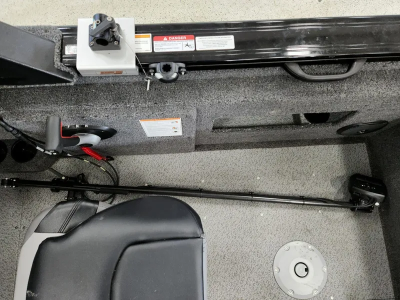 Slide: The Image of Interior of 2025 Crestliner 1850 Fish Hawk WT with seat and controls. - 13