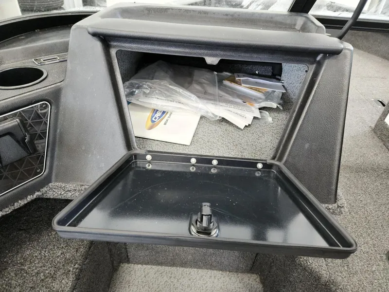 Slide: The Image of Interior view of 2025 Crestliner 1850 Fish Hawk WT storage compartment. - 16